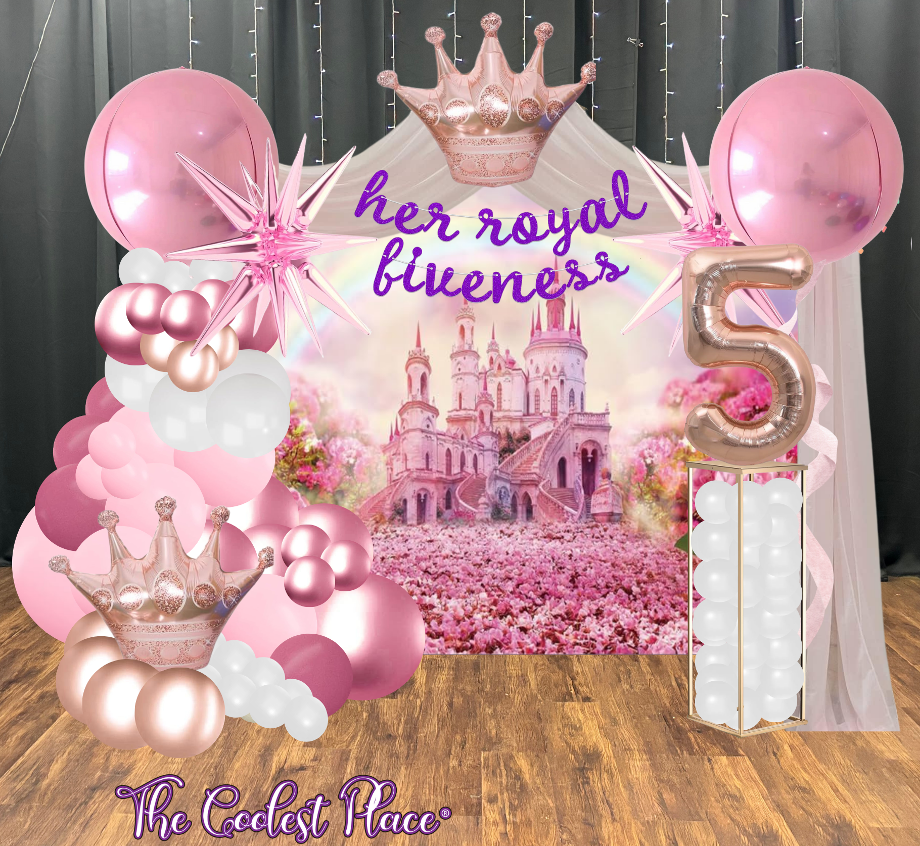 Royal Fiveness Party Decor Setup with Pink balloon arrangements and crown balloons
